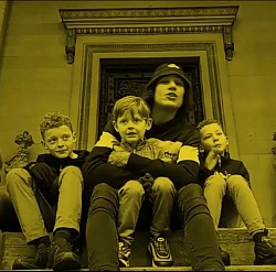 Lewy T (L•K•T) with his son's during the making of the music video for 